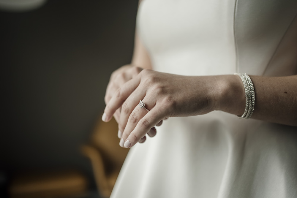 Beautiful bride's hands on her wedding day, captured by Lov Films.